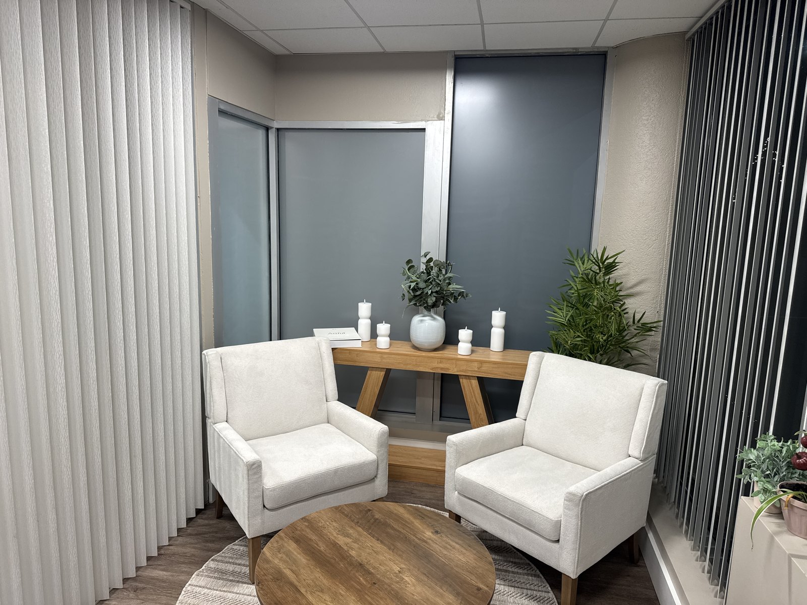 Office sitting area with solid privacy film on glass wall